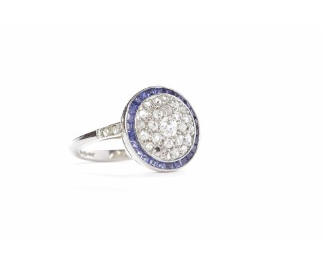 ART DECO STYLE SAPPHIRE AND DIAMOND RINGthe round bezel 13.5m diameter and set with centrally with a central old cushion cut 