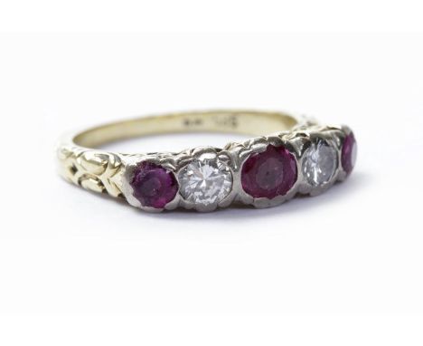 VICTORIAN STYLE RUBY AND DIAMOND FIVE STONE RINGset with alternating round brilliant cut diamonds totalling approximately 0.3