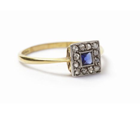 ART DECO SAPPHIRE AND DIAMOND RINGthe square bezel 8mm across with a central square sapphire surrounded by rose cut diamonds,