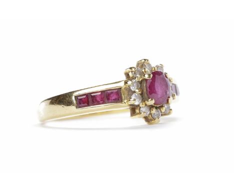 RUBY & DIAMOND CLUSTER RING set with an oval ruby surrounded by round brilliant cut diamonds with three princess cut rubies c