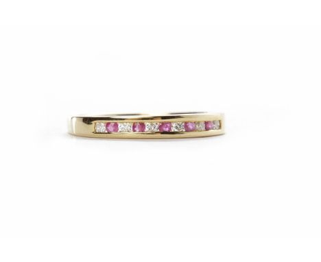RUBY AND DIAMOND HALF ETERNITY RINGwith five rubies and six round brilliant cut diamonds, size O, in nine carat gold