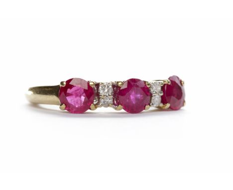 RUBY AND DIAMOND RINGset in nine carat gold, size M