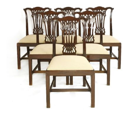 A set of six Chippendale-style mahogany dining chairs, each with a pierced splat back and drop-in seat, eight standard and tw