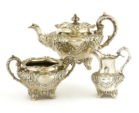 A Victorian silver tea set,William Marshall, Edinburgh 1839,the teapot with a wrythen foliate finial on an outswept foliate l