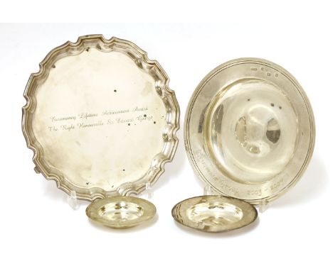 A modern silver salver, Sheffield, Camelot Silverware Ltd., with a Chippendale-style border and on short scrolling feet, insc