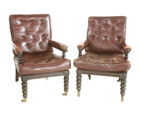 A pair of late Victorian elbow chairs,with bobbin turned frames and red leather buttoned cushions (2)