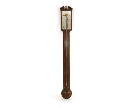 A George III mahogany stick barometer,by George Adams, London, c.1780, the broken arch pediment over a silvered vernier scale