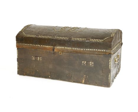A leather and brass studded dome top trunk,c.1750, the lid initialled 'E E' over 'S G', opening to reveal a red leather inter