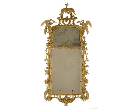 A Chippendale period giltwood wall mirror,surmounted by an 'arbour', scrolls and a pair of ho ho birds over a split plate, th