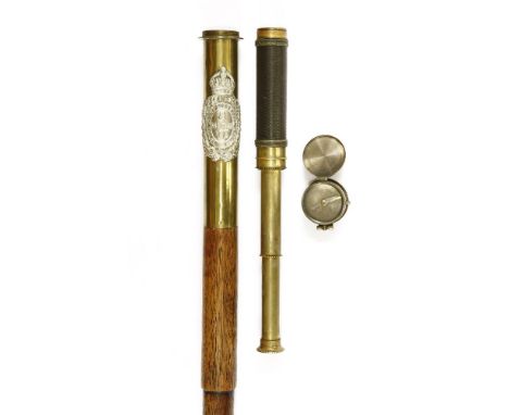 A Victorian stepped wooden walking stick,having a brass handle carrying the crest of the Kings Liverpool Regiment 8 Scottish 