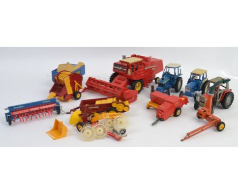 BRITAINS; A collection of vintage Britains Farm loose diecast models and accessories, to include Combine Harvester and other 