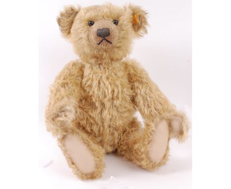 STEIFF; A Steiff large Golden mohair teddy bear 000560, with growler. Approx 42cm tall. Complete with Steiff button to ear. 