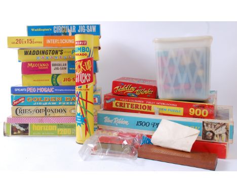 TOYS & GAMES; A collection of assorted vintage jigsaw puzzles and games to include Merit Pickup Sticks, Meccano puzzle, Waddi