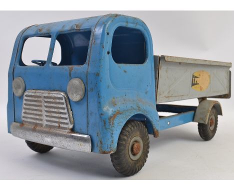 TRIANG; A vintage pressed tin Triang Toys Tipper Lorry in blue, with grey cap and the rubber tyres stamped ' Triang ' 46cm lo