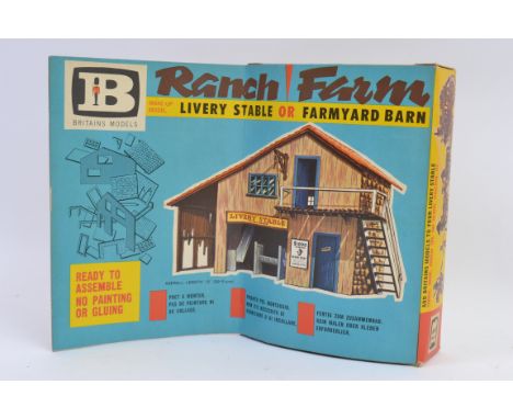 BRITAINS; An original vintage Britains 4720 boxed Livery Stable / Barn. Within the original box, with instructions. Appears t
