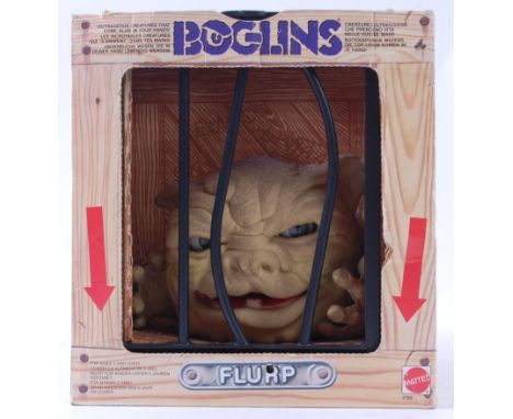 BOGLINS; An original vintage Boglins ' Flup ' action figure. Within the original display 'cage' box. Made by Mattel. 