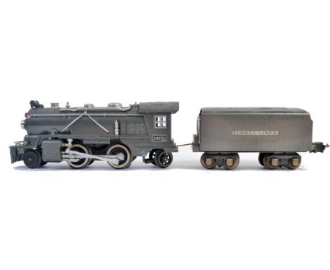 LIONEL TRAINS; An original vintage Lionel Trains 0 gauge tinplate 249E railway trainset locomotive and 256W matching tender. 