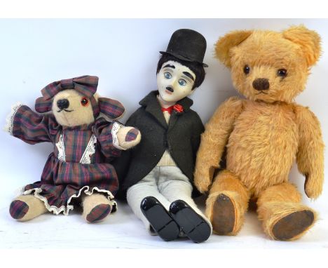 DOLLS & BEARS; A collection of three 20th century dolls and teddy bears to include a mohair leather padded teddy bear, a smal