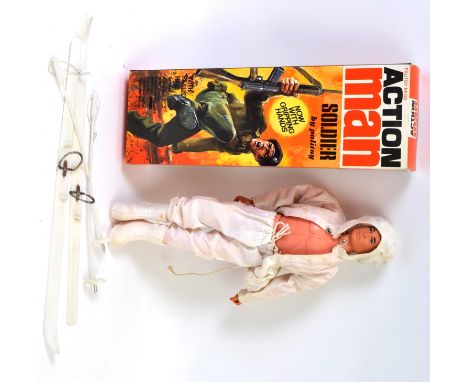 ACTION MAN; An original vintage Action Man soldier, within the original box. Wearing a ski uniform, the figure also comes wit
