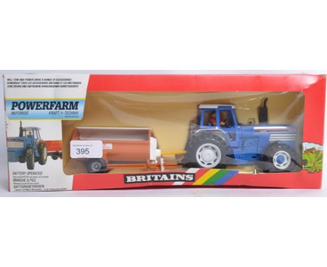BRITAINS; An original Britains Powerfarm diecast model Tractor & Manure Spreader 9382 model. Appears to be unused within the 