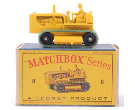 MATCHBOX LESNEY; An original vintage diecast model Matchbox Lesney No. 8 Caterpillar Tractor. Yellow, with black plastic whee