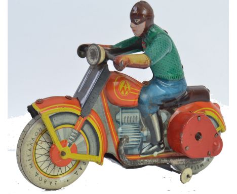 TINPLATE; An original vintage tinplate Russian made clockwork motorcycle and rider. Russian text to tyres, lithograph printed