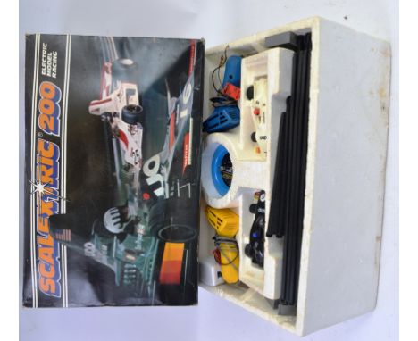 SCALEXTRIC; An original vintage Scalextric 200 electronic racing set, within the original box. Appears to be complete, with b