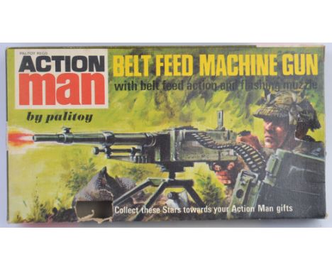 ACTION MAN; An original vintage Action Man Palitoy Belt Feed Machine Gun, within the original box. 