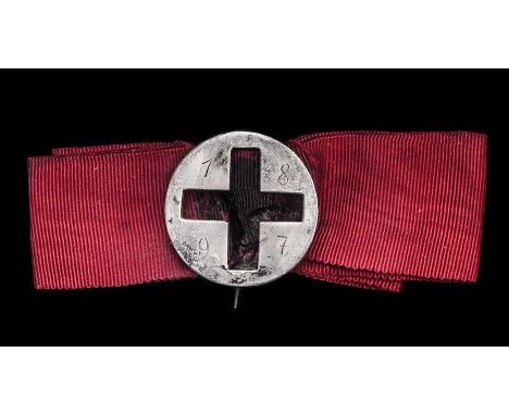 *Greece, Hellenic Red Cross Decoration for the Greco-Turkish War 1897, a silver and red enamel pin-back badge mounted on red 