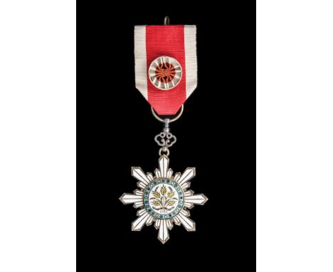 *China, Order of the Golden Grain, Fourth Class breast badge, in silver-gilt and enamels, width 56mm, good very fine