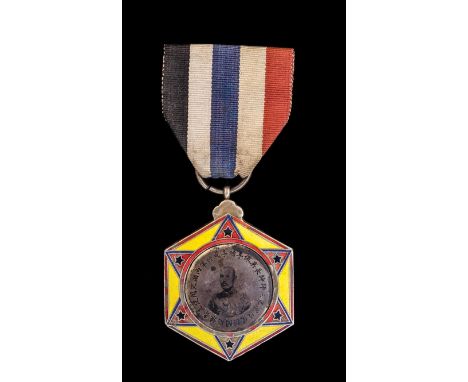 *China, Wei Pei Fu Merit Medal, circa 1925, in silver-gilt and enamels, with tin-type central portrait of the Marshal, width 