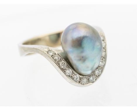 A cultured pearl and diamond set 14ct white gold ring, comprising a baroque blue/grey pearl approx 12 x 8mm, within a diamond