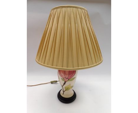 A 1990's Moorcroft Lamp in the Magnolia Design by Walter Moorcroft , with shade , lamp fitted but untested