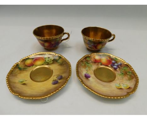 Two Royal Worcester Mid 20th Century rope edged Cups and Saucers , decorated with fruits one signed J.Smith , the other&nbsp;