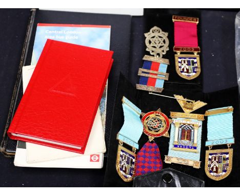 Masonic interest: a large collection of items to include robes, books, silver and enamel brooches etc., including items from 