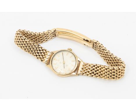Omega- a ladies 9ct gold vintage Omega watch, comprising a round signed silvered dial with applied baton markers, case approx