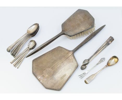 A collection of mixed silver items to include; a matching dressing table mirror and brush, both in the Art Deco style with en