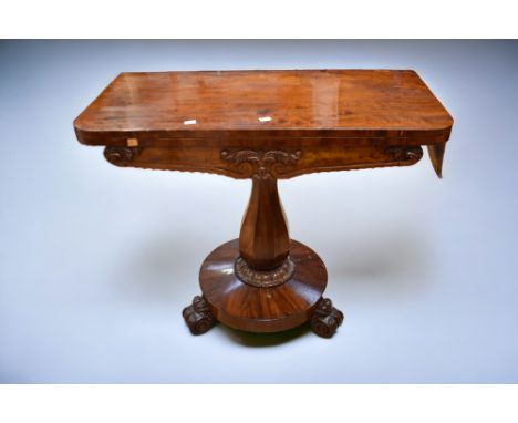 A Victorian card table in mahogany