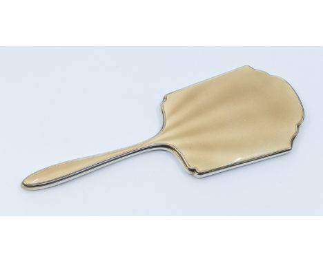A George V silver vanity mirror, with golden brown enamel back, hallmarked by Albert Carter, Birmingham, 1935, approx. 28.2 c
