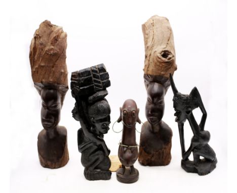 A collection of 20th century African Tribal tourist figures to include; a mid century Kenyan carved wooden Wakamba Tribe (Eas