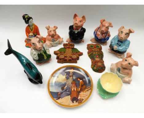 A collection of mixed ceramic figures , some continental, ornately decorated together with 6 wade Natwest pigs and 6 collecto