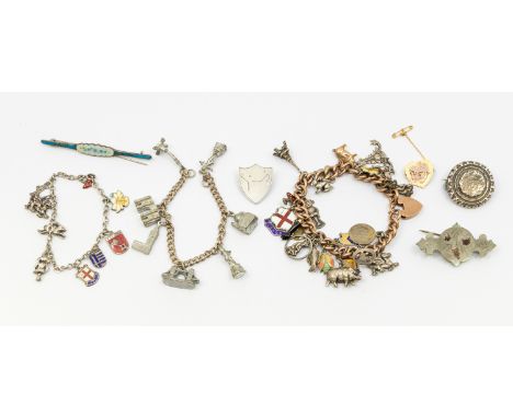 A 9ct gold charm bracelet, width approx 8mm, links marked 9c, suspending a 9ct gold pig charm along with various silver and w