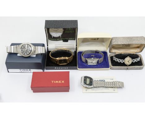A collection of five vintage and later ladies and gents wristwatches to include a Casio digital wristwatch, along with Accuri