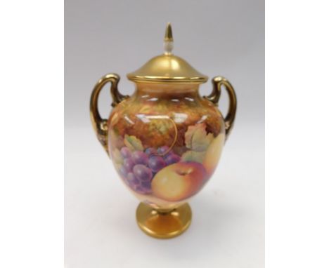 A Royal Worcester Mid 20th Century 2 handled Urn shaped vase and cover , decorated with Fruit , signed J. Reed , factory mark