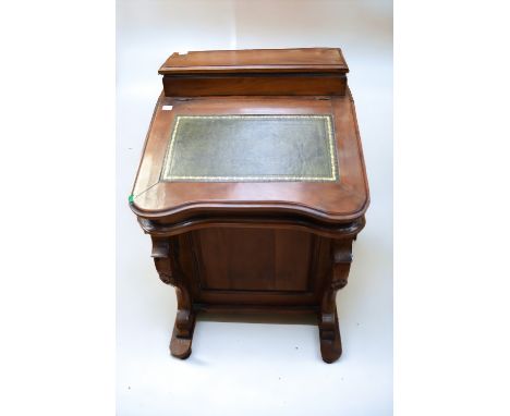 A 19th Century Davenport with side drawers and green leather writing insert along with a mahogany book stand/shelf.