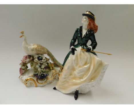 &nbsp;Royal Crown china peacock, mid 20th Century along with a Royal Worcester lady figure "Royal Enclosure".