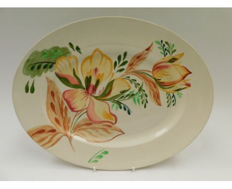A Clarice Cliff oval platter , Hand painted underglaze floral design ,Royal Staffordshire signature stamp to rear.