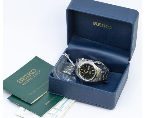 Seiko- a gentleman's Seiko Kinetic steel cased wristwatch, comprising a signed round signed black dial with applied baton mar