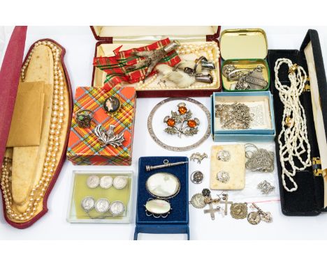 A collection of costume jewellery to include twa cultured fresh water pearl necklace, along with silver Scottish thistle broo