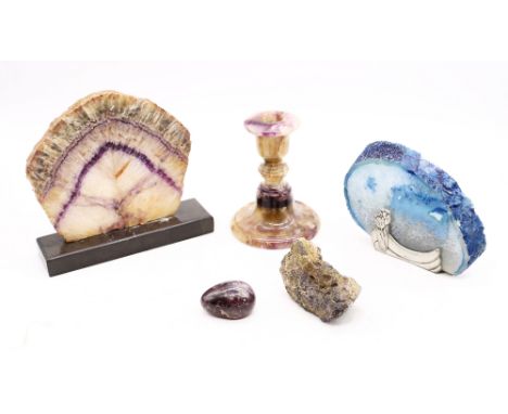 Derbyshire interest :- early to mid 20th Century blue john candle stick, large slice on stand, egg, sample rock and slice of 